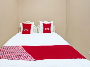 OYO 91846 Ms Rini Homestay Syariah - Chambre