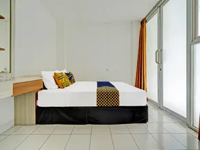 Hotel O Alamanda 7 Syariah - Zimmer