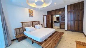 Cowrie Shell Beach Apartments Official - Zimmer