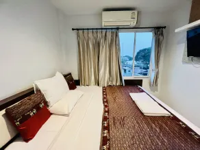 INN Kham Apartment - Quarto