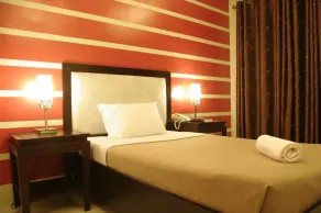 The Red Palm Suites and Restaurant - Chambre