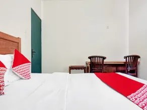 Hotel O 90596 Hotel Griya Astoeti - Habitación