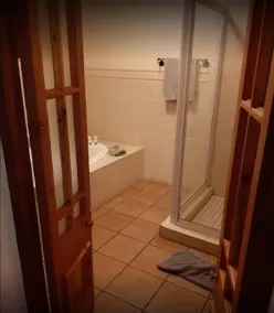 Pumulani Lodge - Badezimmer