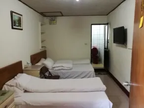 Xia Xing Inn - Chambre