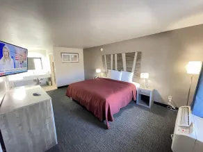 Excellent Inn & Suites - Chambre