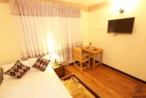 Aarya Chaitya Inn - Zimmer