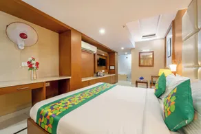 Treebo Premium Vinnie - Near Airport - Chambre