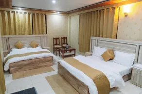 Hotel SNR Grand - Zimmer