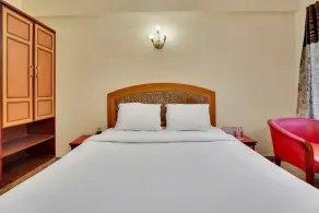 iROOMZ Aura Inn - Quarto