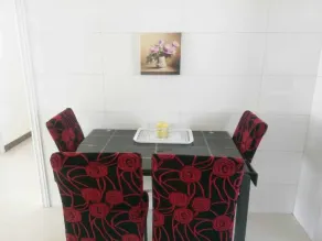 Wang you Apartment - Essbereich im Zimmer