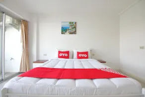 Super OYO 498 Ladawan Villa - Habitación