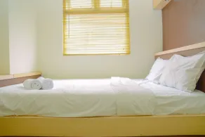 Fully Furnished and Cozy 2BR at Green Pramuka City Apartment - Habitación