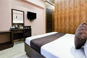 Fabhotel Prime The Rivlet Inn - Zimmer