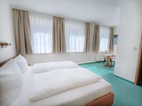 REGIOHOTEL Bunte Stadt Wernigerode - Room