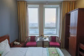 Ngan Ha Hotel - Zimmer