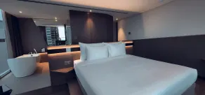 Draco Hotel & Suites - Habitación
