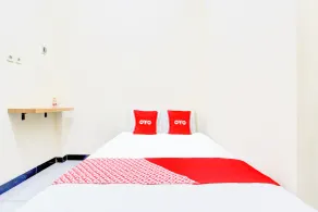 Hotel O Ekslusive Double'n - Zimmer
