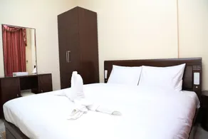 Safari Hotel Apartments - Værelse