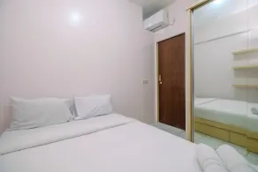 Comfort 2BR at Bogor Mansion Apartment By Travelio - Værelse