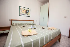 Wohlfühlwohnung am Gemeinschaftspool in Rosolina - Zimmer