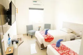 Mel's Inn Manado - Room