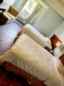 Metro Inn & Suites - Room
