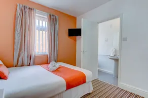 The Sandringham Court Hotel & Apartment Welcoming Large and Small Groups for 16 years - Chambre