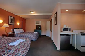 Economy Motel Inn & Suites - Room