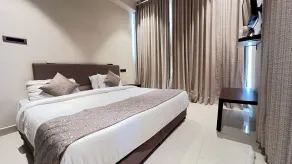 Hotel GMR Pearls - Chambre