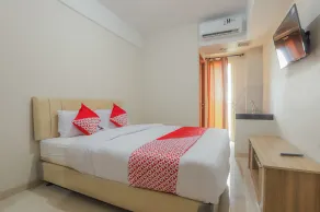 OYO 630 Green Lake View Cimanggis - Habitación