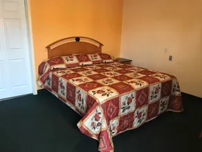 Deluxe Inn - Chambre