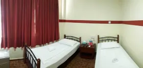 Warisan Family Inn - Værelse