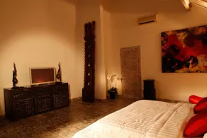 Villa Infinity Bali es una propiedad de 5 estrellas, 8 habitaciones con baño privado. - Habitación