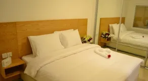 Khuttar Apartment - Room