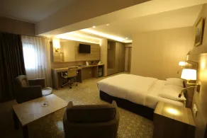 Hotel Excellence Inn - Habitación
