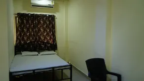 Vellankani Resort Gorai - Chambre