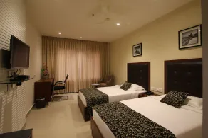 Hotel Hyderabad Grand - Room