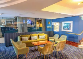 Peninsula All-Suite Hotel - Vestíbulo
