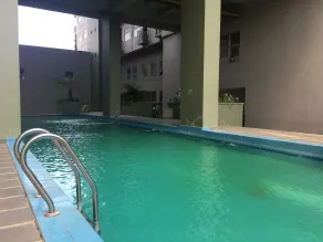 Cozy Furnished 2BR Apartment at Grand Asia Afrika By Travelio - Piscina