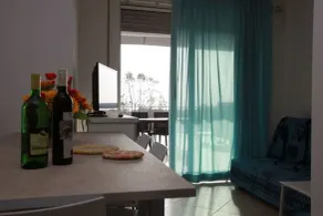 Wonderful attic flat with sea view - Sala de estar