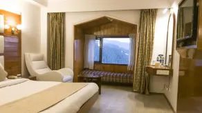 Royal Jardin Whistling Pines Resort - Room