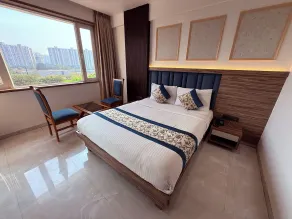 Hotel Kushala Grand, Dombivali - Vue de la chambre
