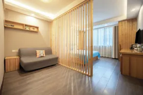 Huayi Hotel - Chambre