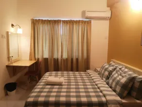 Aurora Court Service Apartment - Habitación