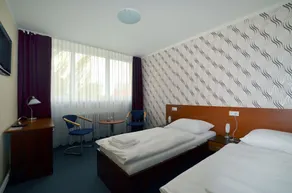 Hotel Arkáda - Chambre