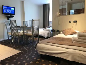 Grand Plaza Serviced Apartments - Chambre