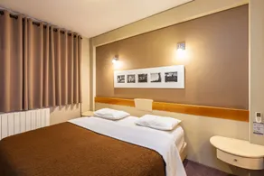 Tri Hotel & Flat Caxias - Habitación