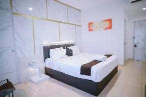 Grand Malioboro Hotel Yogyakarta - Zimmer