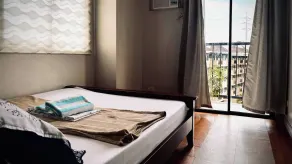 Spacious Central Davao City Getaway - Spacious Apartment with Shared Pool - Zimmer