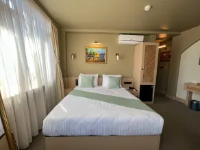 By Kinyas Hotel - Room